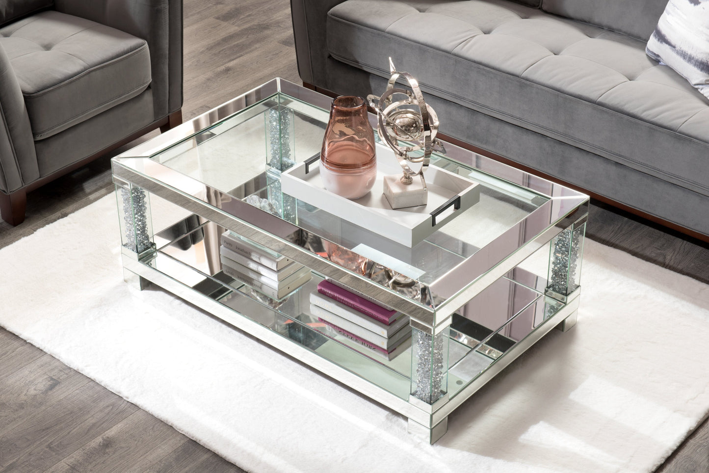 Berni 47.2" Glam Mirror & Glass Top Coffee Table with Shelf - Silver Metal with Diamond Look Legs|Table à café somptueuse Berni de 47,2 po avec dessus en miroir et en verre et tablette - métal argenté avec pattes à apparence de diamant