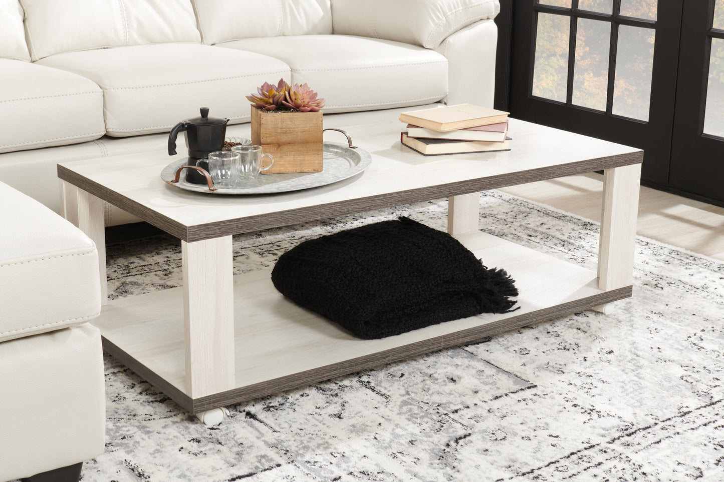 Flynn 47.25" Modern Coffee Table with Shelf and Casters - White and Grey |Table à café moderne Flynn de 47,25 po avec tablette et roulettes - blanche et grise