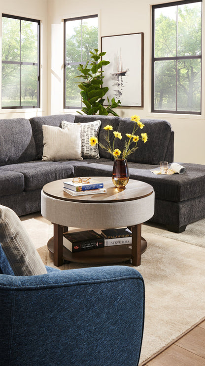 Elroy 33" Rustic Round Lift Top Coffee Table With Storage, Shelf and Casters - Brown and Grey with Fabric Edge|Table à café ronde rustique Elroy de 33 po avec dessus relevable, rangement, tablette et roulettes - brune et grise avec bordure en tissu