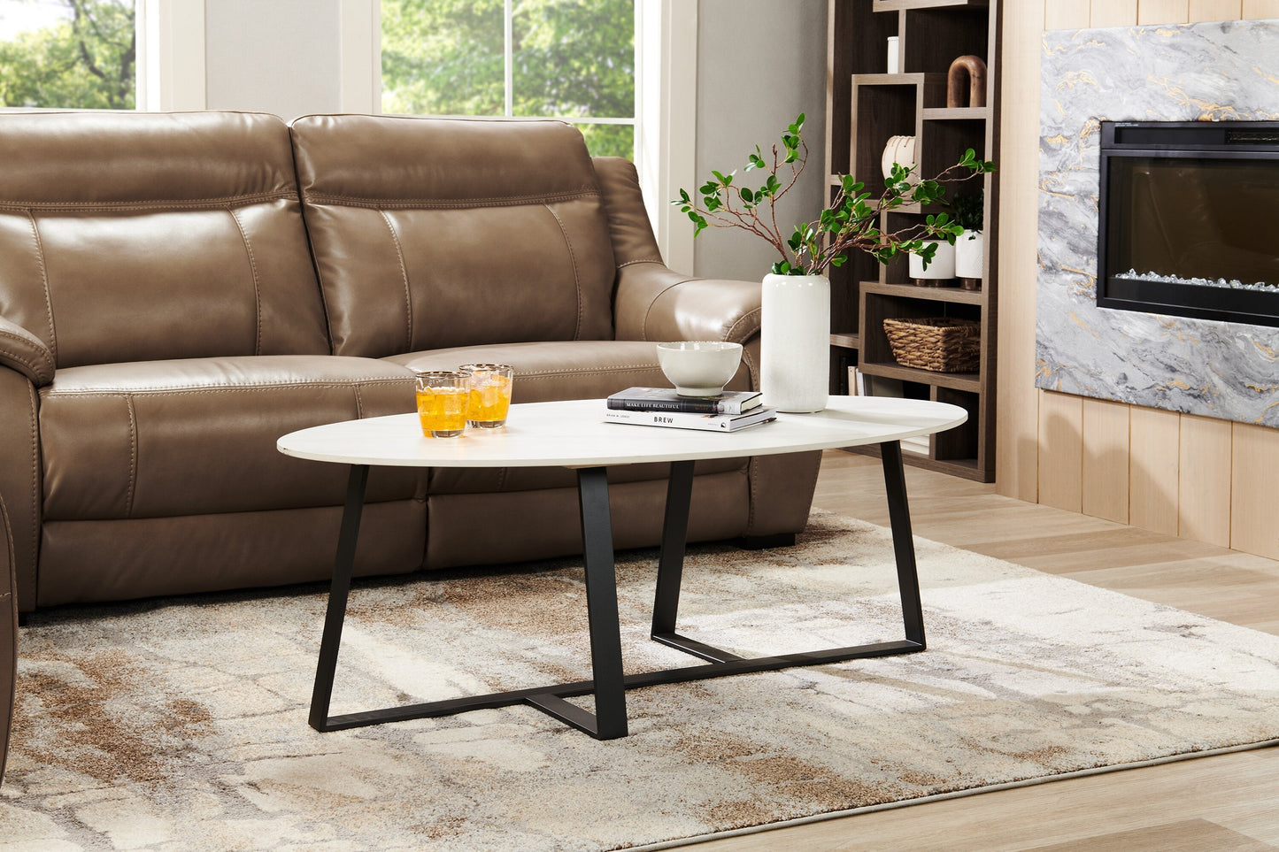 Kort & Co. Nico 51" Modern Oval Coffee Table - White Sinetered Stone with Dark Grey Metal Legs|Table à café ovale moderne Nico de Kort & Co. de 51 po - pierre frittée blanche avec pattes en métal gris foncé